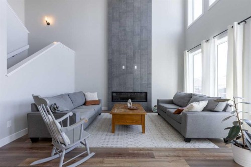 4889 7Th Street West, Claresholm, AB - Indoor Photo Showing Living Room With Fireplace