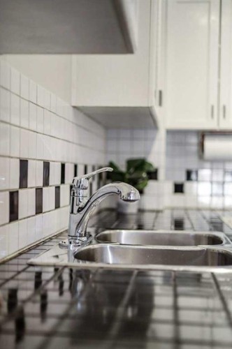 3511 Forestry Avenue South, Lethbridge, AB - Indoor Photo Showing Kitchen With Double Sink