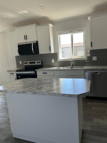 2004 Sunflower Crescent, Coaldale, AB - Indoor Photo Showing Kitchen