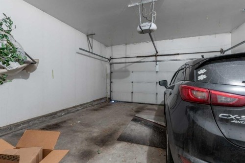 327 Heritage Crescent West, Lethbridge, AB - Indoor Photo Showing Garage