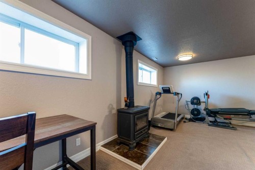 21054 A Range Road 264, Cardston, AB - Indoor Photo Showing Gym Room