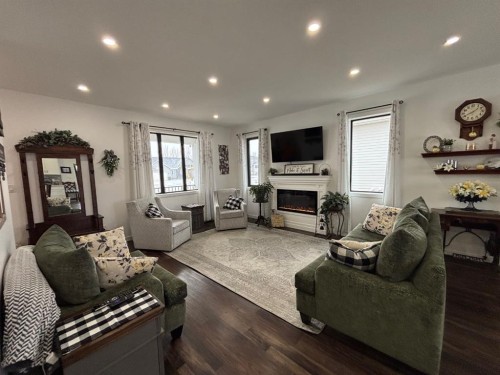 349 E 1 Avenue North, Magrath, AB - Indoor Photo Showing Living Room With Fireplace