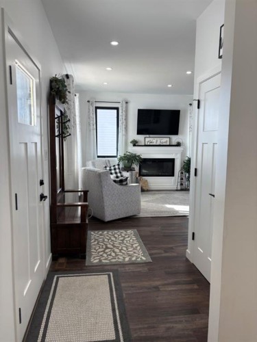 349 E 1 Avenue North, Magrath, AB - Indoor With Fireplace