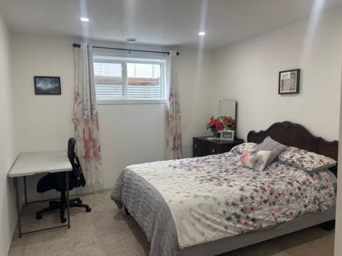 349 E 1 Avenue North, Magrath, AB - Indoor Photo Showing Bedroom