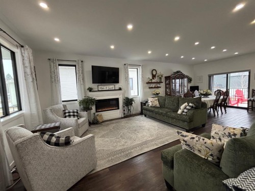 349 E 1 Avenue North, Magrath, AB - Indoor Photo Showing Living Room With Fireplace