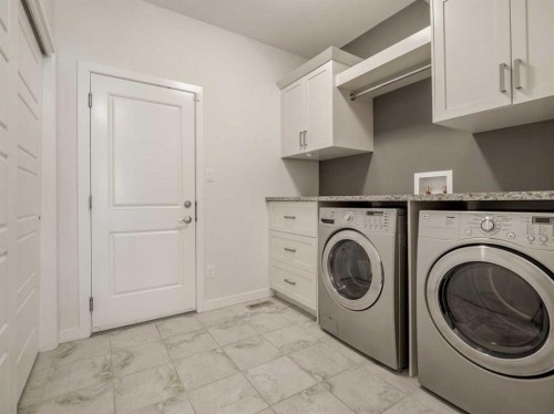 98 Moonlight Boulevard West, Lethbridge, AB - Indoor Photo Showing Laundry Room