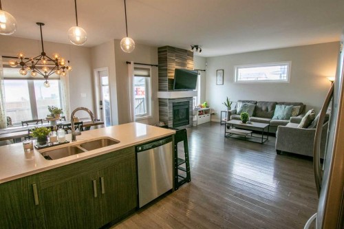 128 Cabot Landing West, Lethbridge, AB - Indoor With Fireplace