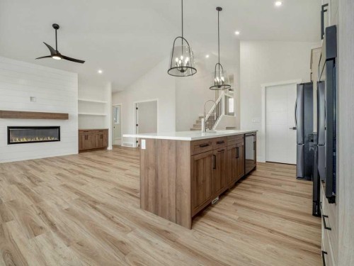 4517 40 Avenue South, Lethbridge, AB - Indoor With Fireplace