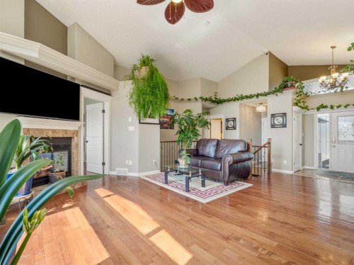 314 Coulee Springs Terrace, Lethbridge, AB - Indoor Photo Showing Living Room With Fireplace