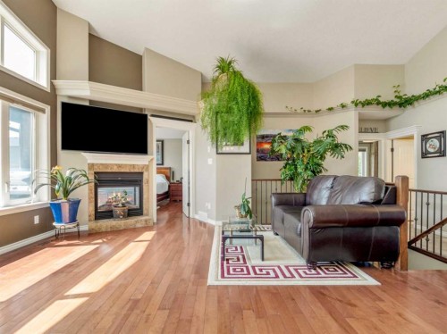 314 Coulee Springs Terrace, Lethbridge, AB - Indoor Photo Showing Living Room With Fireplace