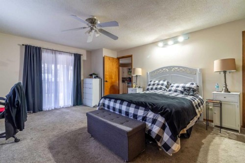 253 51 Avenue E, Claresholm, AB - Indoor Photo Showing Bedroom