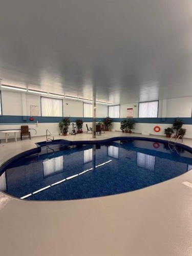 312-75 Temple Boulevard West, Lethbridge, AB - Indoor Photo Showing Other Room With In Ground Pool
