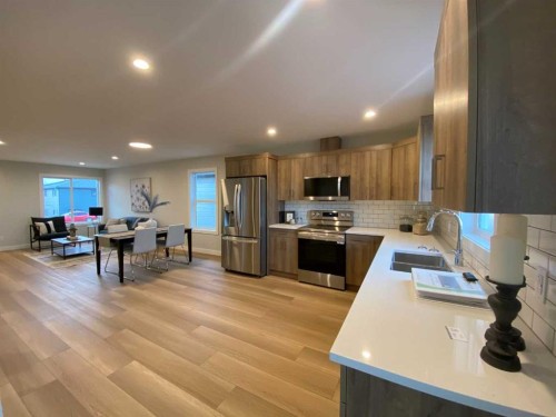 4213 57 Street, Taber, AB - Indoor Photo Showing Kitchen With Stainless Steel Kitchen With Double Sink