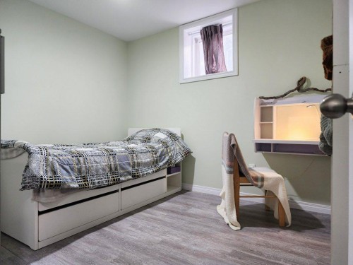 408 49 Avenue East, Claresholm, AB - Indoor Photo Showing Bedroom