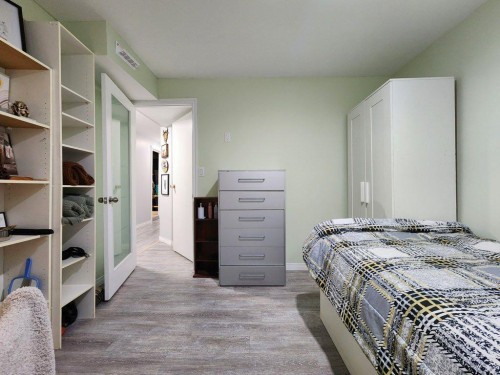 408 49 Avenue East, Claresholm, AB - Indoor Photo Showing Bedroom