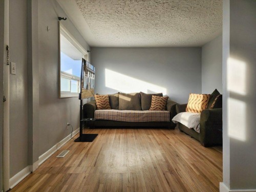 408 49 Avenue East, Claresholm, AB - Indoor Photo Showing Living Room