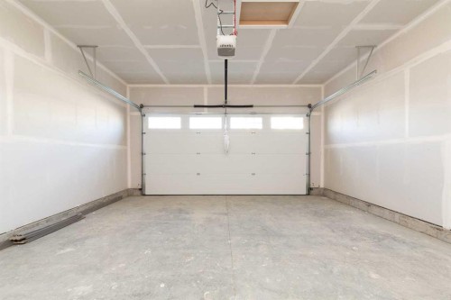 566 Malahat Green West, Lethbridge, AB - Indoor Photo Showing Garage
