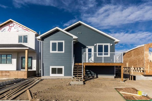 566 Malahat Green West, Lethbridge, AB - Outdoor With Deck Patio Veranda