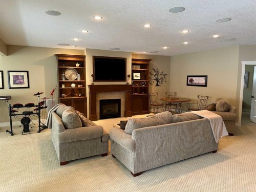 406 Stonecrest Terrace West, Lethbridge, AB - Indoor With Fireplace