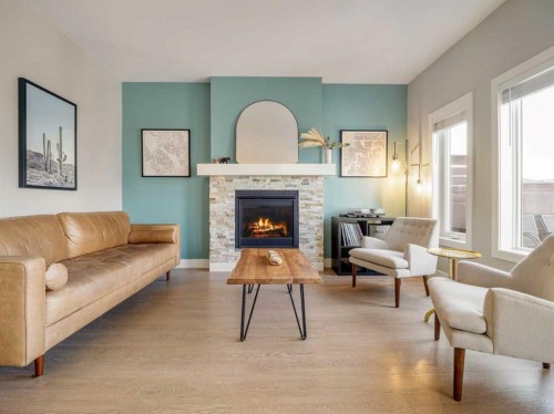 166 Crocus Terrace West, Lethbridge, AB - Indoor Photo Showing Living Room With Fireplace