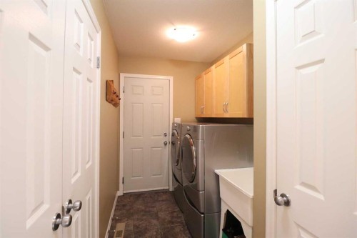 50 Riverbrook Close West, Lethbridge, AB - Indoor Photo Showing Laundry Room