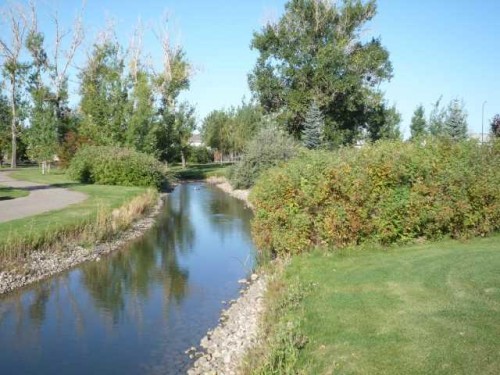 50 Riverbrook Close West, Lethbridge, AB - Outdoor With Body Of Water With View