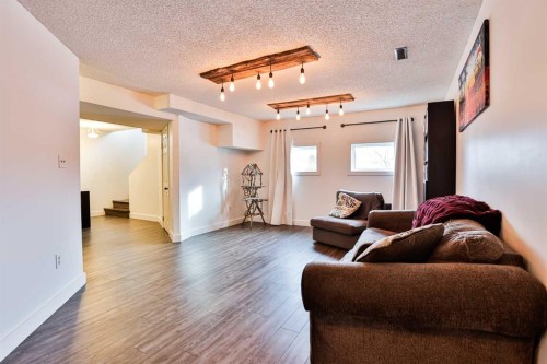 285 Jerry Potts Boulevard West, Lethbridge, AB - Indoor Photo Showing Living Room