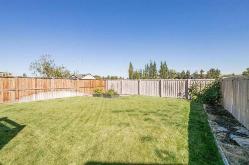 139 Firelight Way West, Lethbridge, AB - Outdoor With Backyard