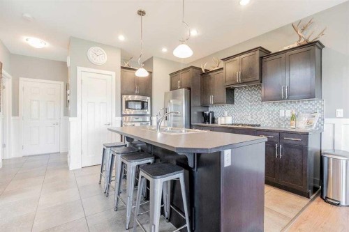 139 Firelight Way West, Lethbridge, AB - Indoor Photo Showing Kitchen With Double Sink With Upgraded Kitchen