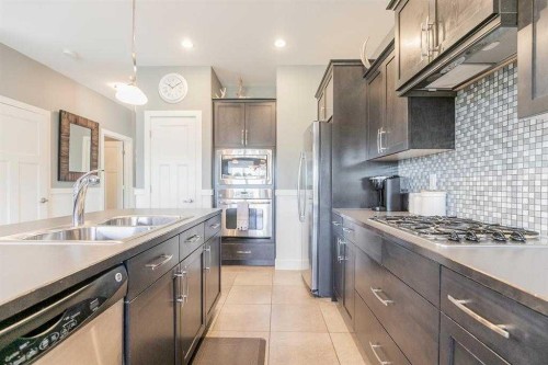 139 Firelight Way West, Lethbridge, AB - Indoor Photo Showing Kitchen With Double Sink With Upgraded Kitchen