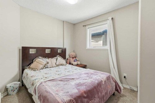 432 Firelight Point West, Lethbridge, AB - Indoor Photo Showing Bedroom