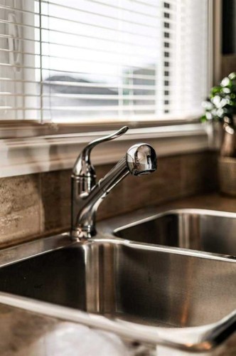 248 Sunridge Road West, Lethbridge, AB - Indoor Photo Showing Kitchen With Double Sink
