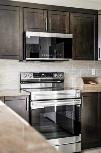 248 Sunridge Road West, Lethbridge, AB - Indoor Photo Showing Kitchen With Upgraded Kitchen