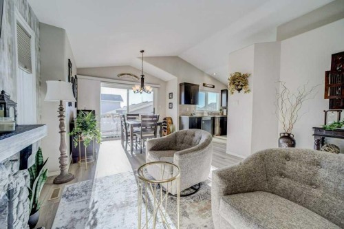 248 Sunridge Road West, Lethbridge, AB - Indoor Photo Showing Living Room With Fireplace