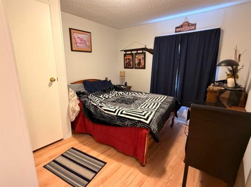 5403 42 Avenue South, Taber, AB - Indoor Photo Showing Bedroom