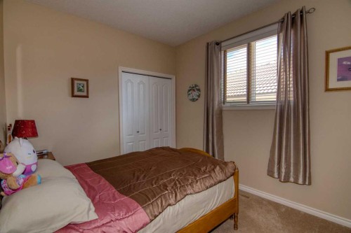 325 Canyon Boulevard West, Lethbridge, AB - Indoor Photo Showing Bedroom