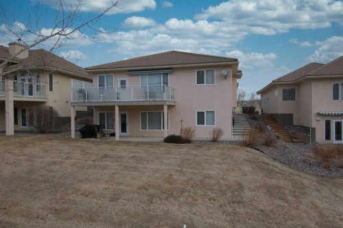 325 Canyon Boulevard West, Lethbridge, AB - Outdoor With Deck Patio Veranda