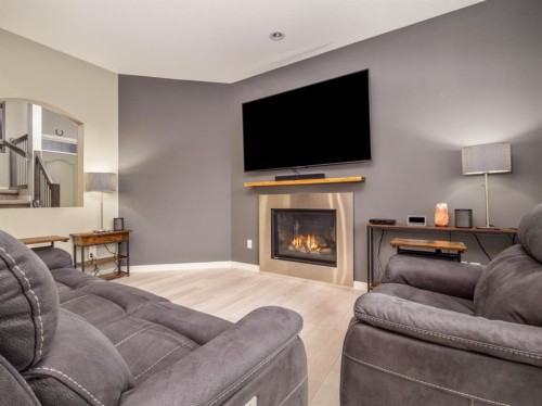 327 Mildred Dobbs Boulevard North, Lethbridge, AB - Indoor Photo Showing Living Room With Fireplace