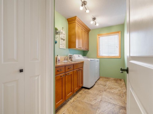 164 Riverstone Boulevard West, Lethbridge, AB - Indoor Photo Showing Laundry Room
