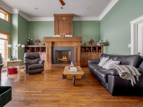 164 Riverstone Boulevard West, Lethbridge, AB - Indoor Photo Showing Living Room With Fireplace