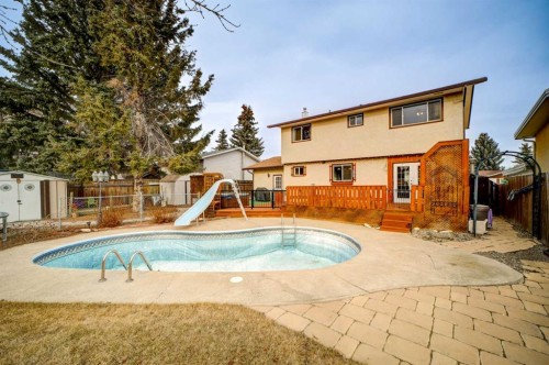 2020 25Th Avenue North, Lethbridge, AB - Outdoor With In Ground Pool