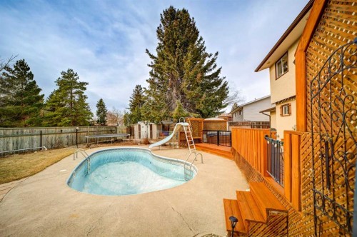 2020 25Th Avenue North, Lethbridge, AB - Outdoor With In Ground Pool With Backyard