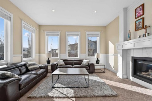 346 Twinriver Road West, Lethbridge, AB - Indoor Photo Showing Living Room With Fireplace