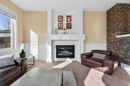 346 Twinriver Road West, Lethbridge, AB - Indoor Photo Showing Living Room With Fireplace