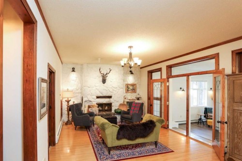 107 Temple Crescent West, Lethbridge, AB - Indoor With Fireplace