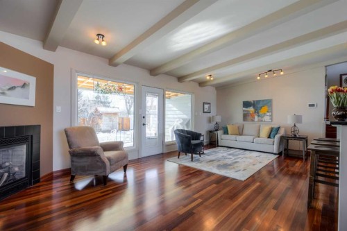 1416 15 Avenue South, Lethbridge, AB - Indoor Photo Showing Living Room With Fireplace