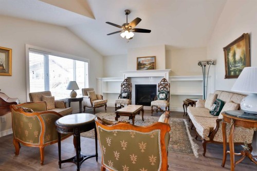 21 Riverford Close West, Lethbridge, AB - Indoor Photo Showing Living Room With Fireplace