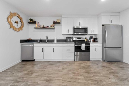 1103 Coalbrook Place West, Lethbridge, AB - Indoor Photo Showing Kitchen With Stainless Steel Kitchen