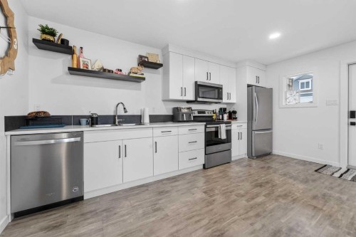 1103 Coalbrook Place West, Lethbridge, AB - Indoor Photo Showing Kitchen With Stainless Steel Kitchen