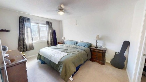 668 Blackfoot Terrace West, Lethbridge, AB - Indoor Photo Showing Bedroom